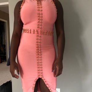 Peach bandage dress.